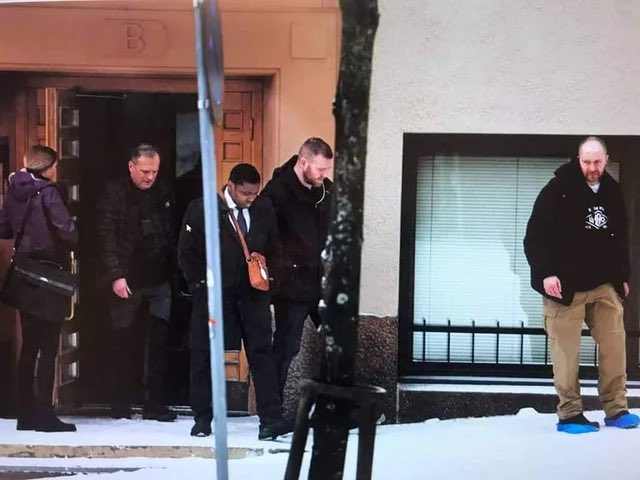 pencraftmedia's tweet photo. Simon Ekpa being escorted by Interpol to go and vote in Nigeria. 

#PeterObi2023 
#PeterObi4President https://t.co/Dm2azSHAZR