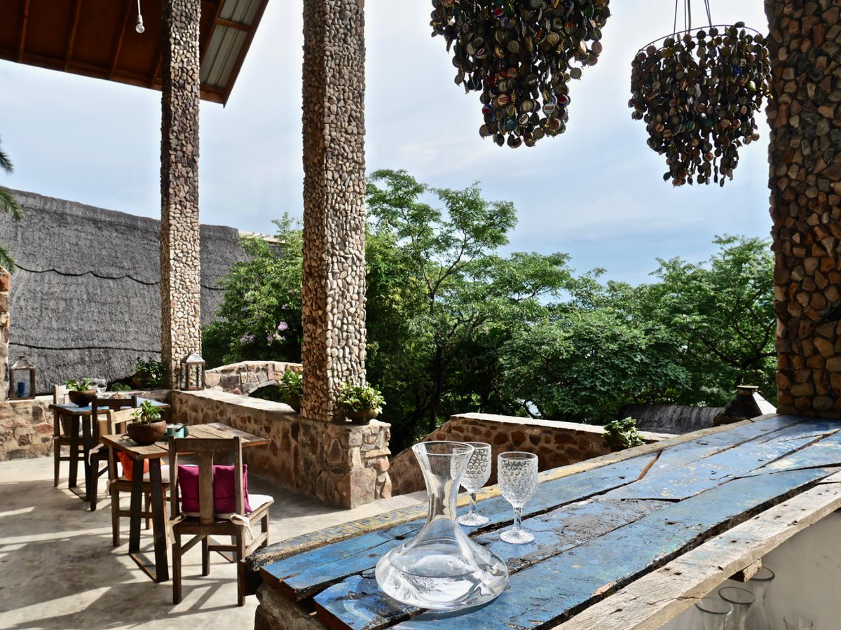 TourismZambia's tweet photo. With intriguing décor combining African artefacts and European antiques, #Kalambo Falls Lodge is a celebration of diversity, capturing the wealth of Zambia's history. You would be hard pressed to find a more exclusive and secluded location on the shores of Lake #Tanganyika. https://t.co/Rl2nuQodhA