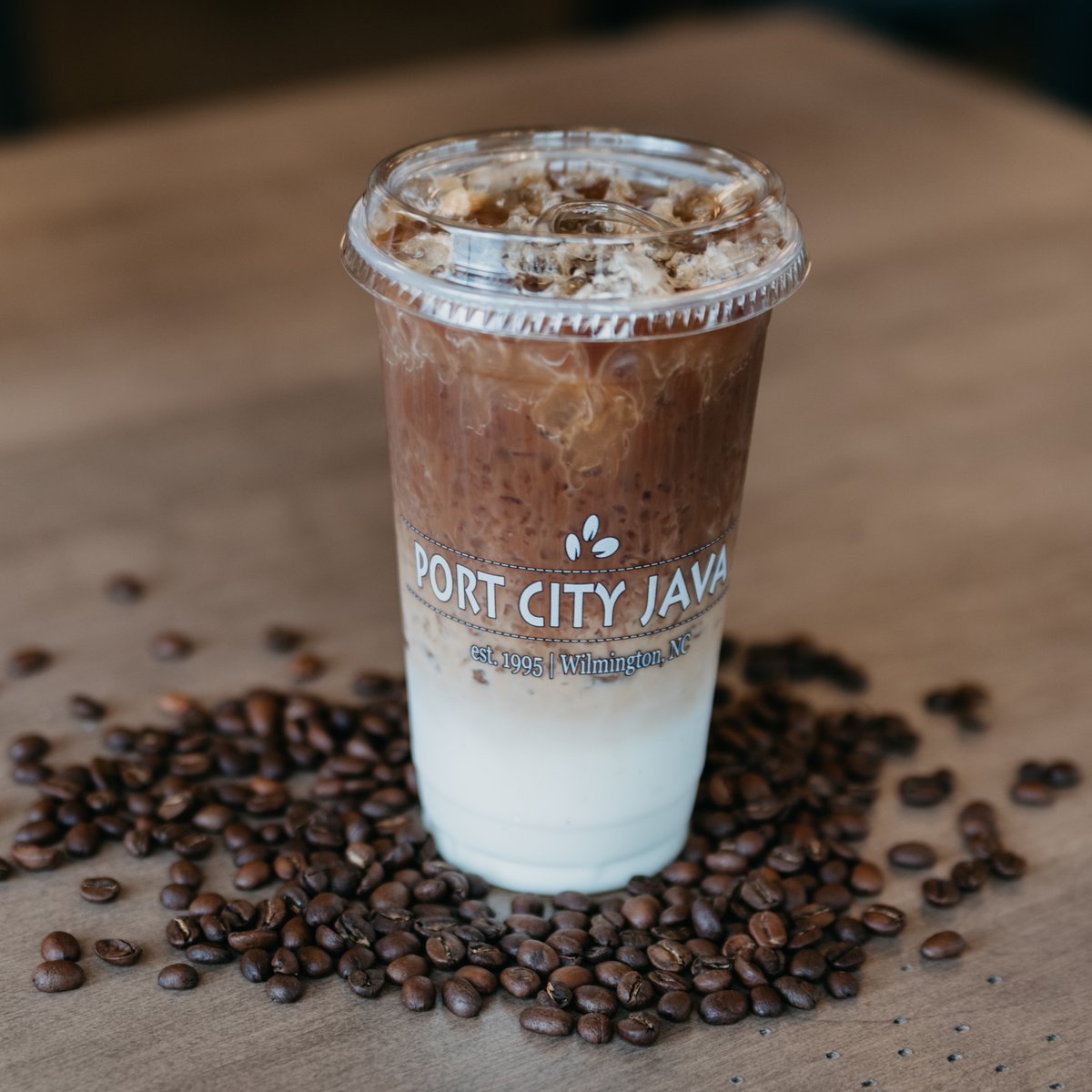 portcityjava's tweet image. The Iced Caramello Leche is one of our favorite drinks to craft! Vanilla syrup and milk over ice with fresh espresso shots poured on top, finished with a thick layer of caramel sauce! Do you stir or shake your Iced Caramello Leche? 🤔