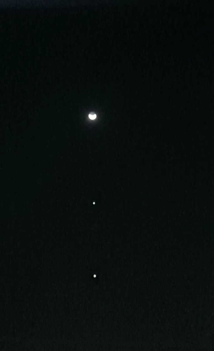 rahultank1993's tweet photo. It was taken about an hour ago.  The crescent moon, Jupiter and Venus.  Incredibly beautiful in person. #JupiterVenusMoon https://t.co/8p73GXpqSG