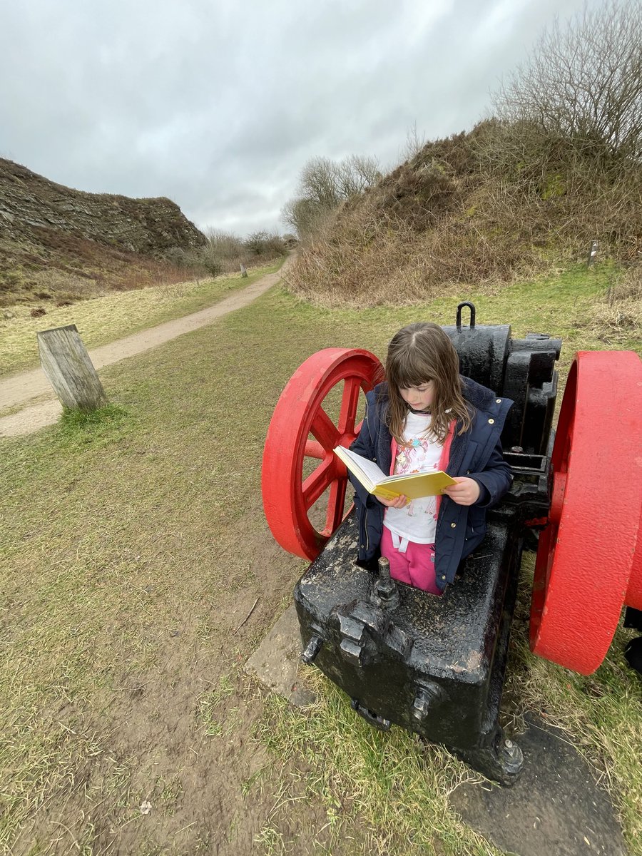 nickpcurrie's tweet photo. Isobel enjoying her book in a rock crusher, at Tegg’s Nose in Macclesfield, although it isn’t in Cheadle Hulme #CHPSReading https://t.co/rGSXcuSOXq