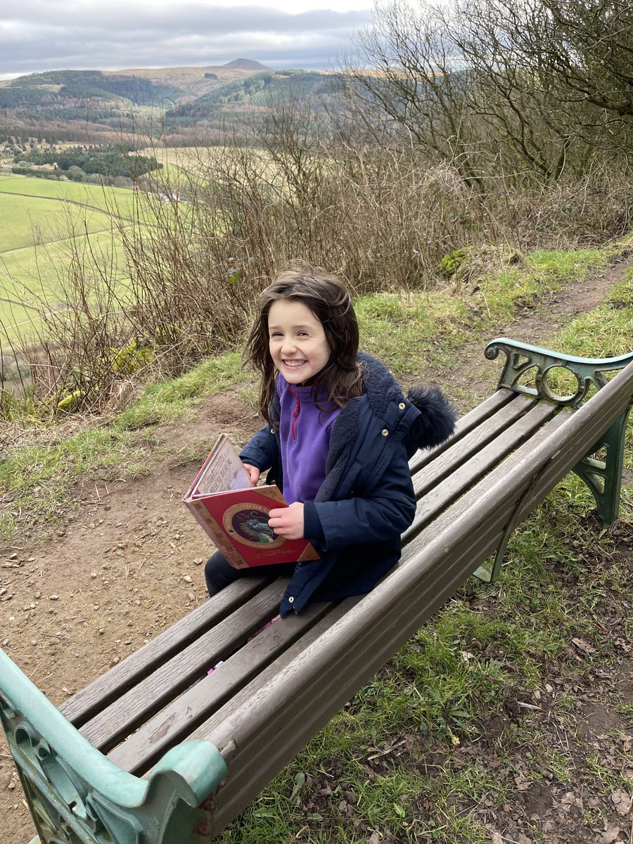 nickpcurrie's tweet photo. Ellie having a well earned rest and enjoying her book, not in Cheadle Hulme though, at Tegg’s Nose park, Macclesfield #CHPSReading https://t.co/srlyY3MCRW