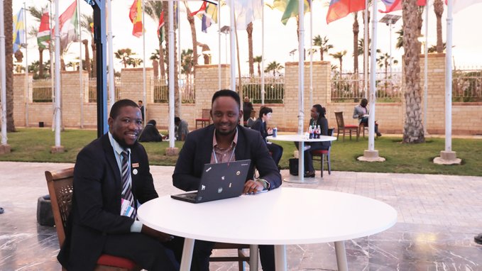 TeeCorc's tweet photo. Great to connect again w/ IIED #CLW2022 alumnus Olivier Ishimwe-now on the fast track to become a #climate negotiator specialising in all things #Article6  of #ParisAgreement! Here's how he navigated intensity of #COP27 w/ help from mentor @IdrissYamikani: https://t.co/EUuaQCj1Bg https://t.co/trpirukTef