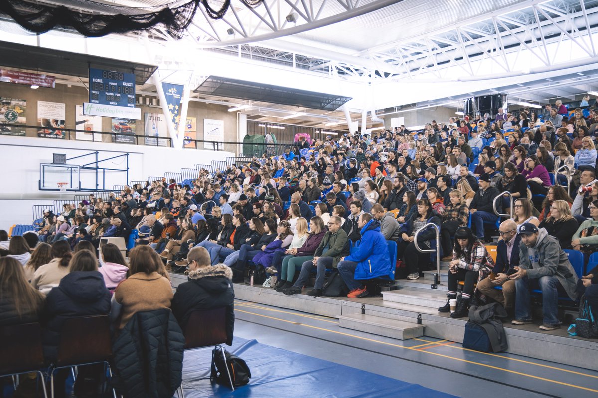 ULethbridgeEdu's tweet photo. @SWATCA has taken over campus, teachers from across southern Alberta are everywhere (we love to see it) and the energy is crazy! If you're attending, be sure to stop by our grad studies table in the 1st Choice Savings Centre AND say hi to our student volunteers in red! 🍎📚 #yql https://t.co/ExtzO1PYsL
