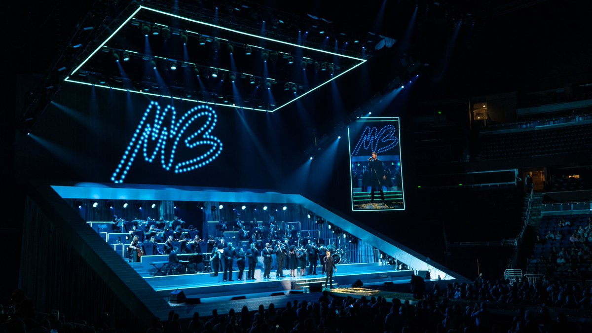 TAITTowers's tweet photo. Big band vibes🎺🎻🎷Glad to see our setup back on the road for @michaelbuble’s European leg of the #TheHigherTour. The tiered Mag Deck stage is perfect for Buble’s band &amp; our custom-built LED frame really accents the design. Shout out to our friends on the road! 📸:@stufishstudio https://t.co/P5ZpEgSsSZ