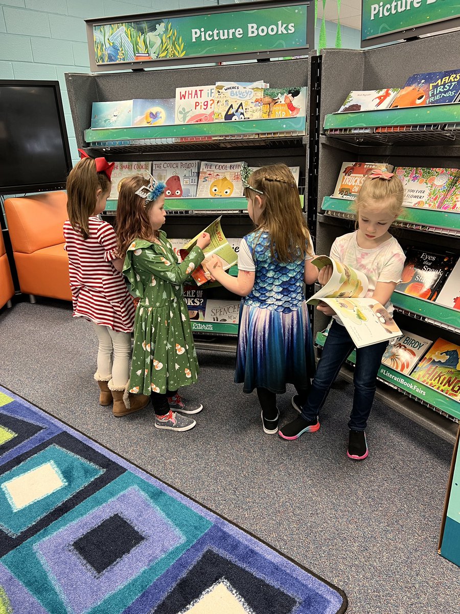 These kinders are pretty serious about perusing great books at our new book fair! #LiteratiBooksFairs #slaughterstrong2223