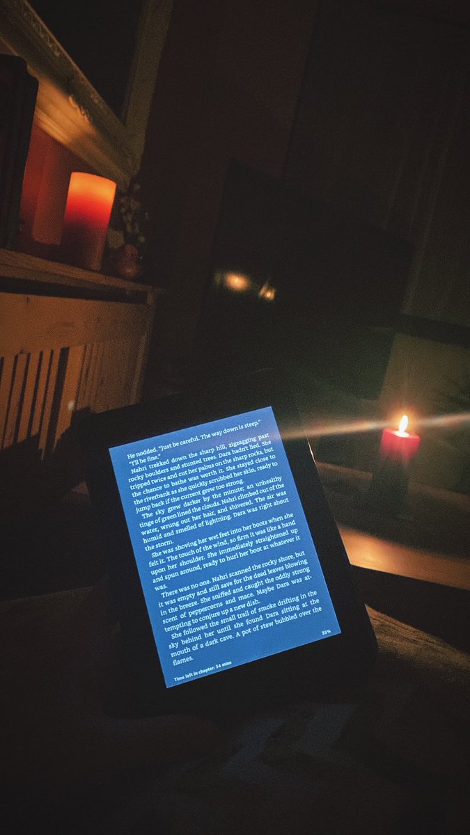 Candlelight reading in a power outage. #books #reading #booklovers #booktwitter #readingnook
