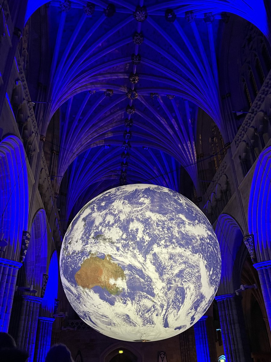 Luke Jerram’s floating earth Gaia ⁦@ExeterCathedral⁩ tonight. Story of the overview effect, one interconnected global eco system, the power of blue spaces 🌎💙 #WetlandsCan