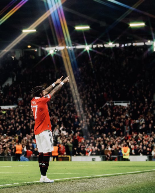 Fred points to the Stretford End in celebration of his goal.