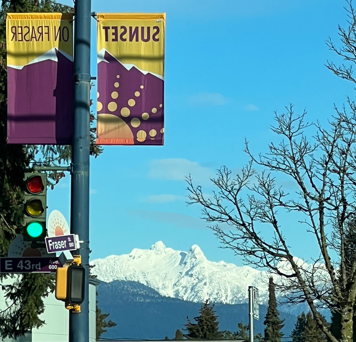 MikeKlassen's tweet photo. A view of #TheLions mountain on the North Shore from #Vancouver’s south side this morning. An absolutely iconic vista that never disappoints.

@SunsetFraser #FraserStreet https://t.co/Gxg1hYPlIw