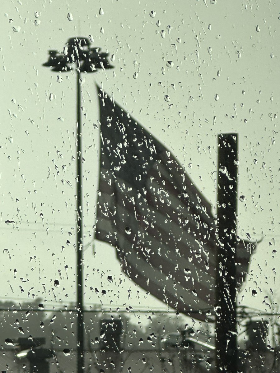 falco's tweet photo. it’s crazy that the flag keeps waiving even when it’s raining, that’s how strong America is

repost if you love this country https://t.co/2BCvZ9aCxp