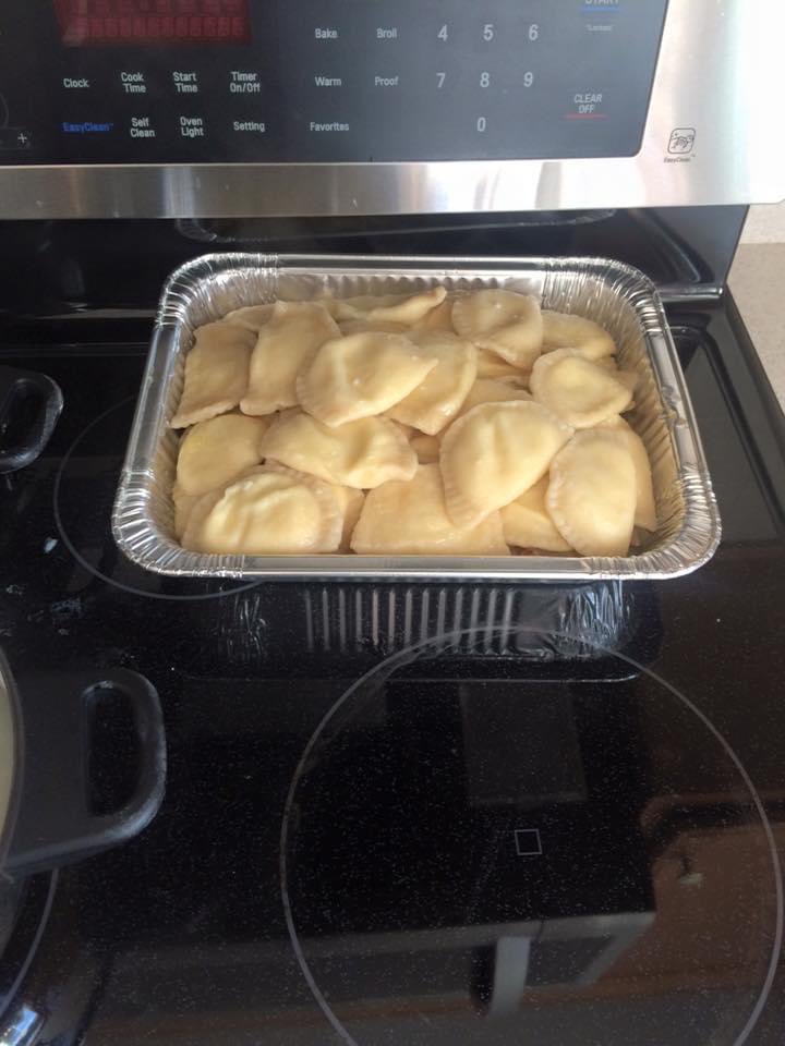 Bondro654's tweet photo. @RossTuckerNFL Tray of homemade ready to fry and some golubki going in the oven. https://t.co/EaeaAGWSEq