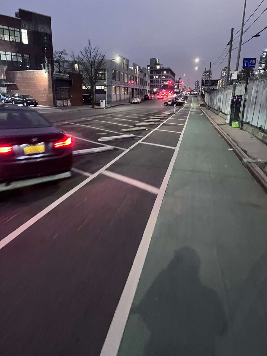 This is low-key one of my favorite designs I’ve seen for a bike lane in New York City, in Sunnyside. And what I like most about it is that it could be in every strip mall and office parking lot across America tomorrow.
