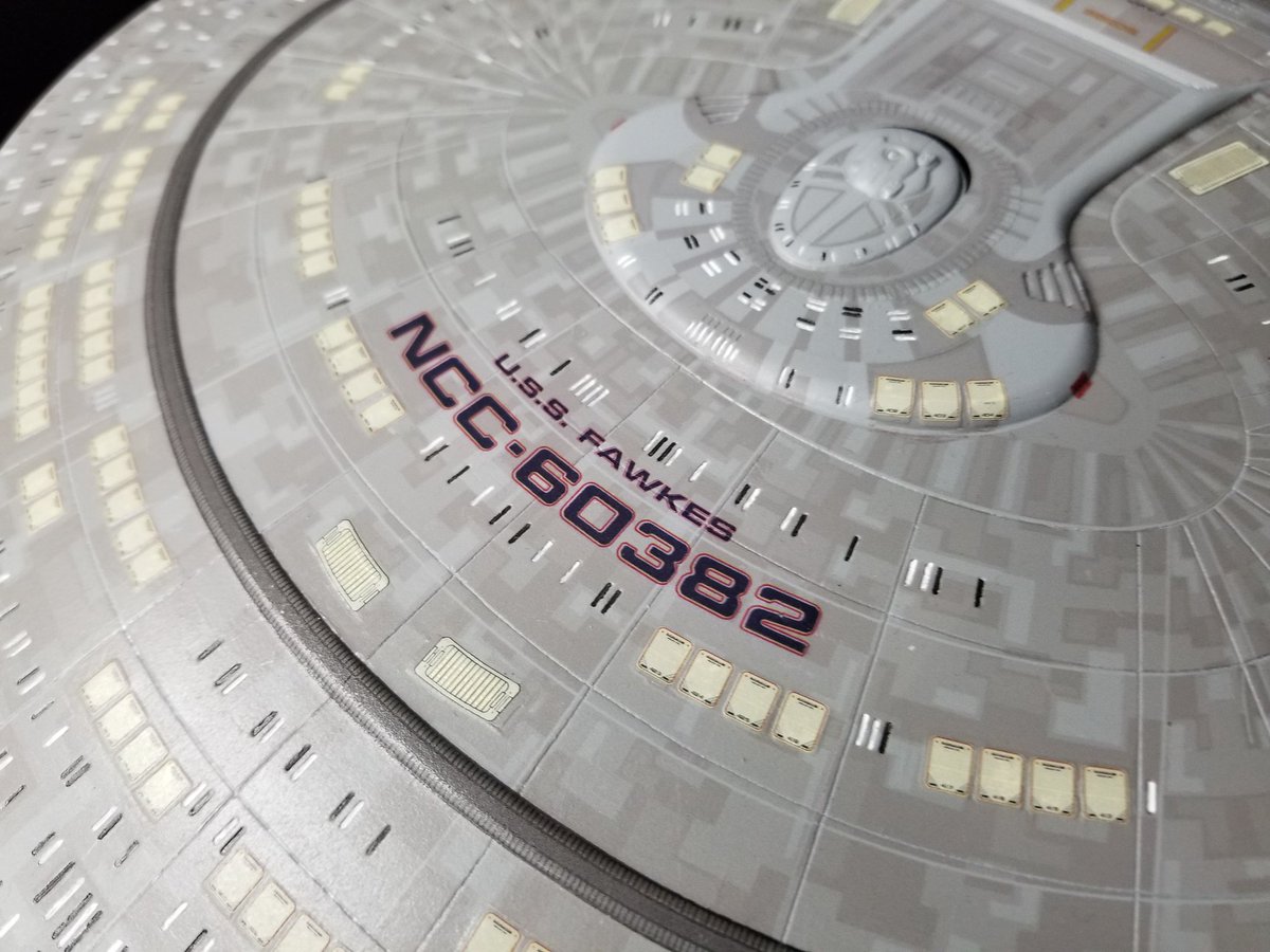 esdi's tweet image. This is my Nebula Class USS Fawkes. It's the Phoenix variant, so, I named it after Dumbledore's phoenix, Fawkes. This is the AMT Enterprise D kit with a conversion kit. And yes, I sanded down the kit's panel lines for a smooth finish. #StarTrek #starships #1400scale