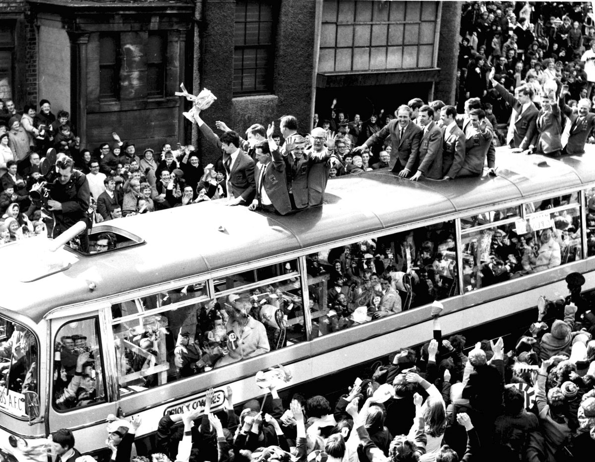 The triumphant North Shields football team parade the FA Amateur Cup to home supporters on their return to Tyneside in 1969. A crowd of over 47,000 at Wembley saw North Shields beat Sutton United 2-1 to win the cup.