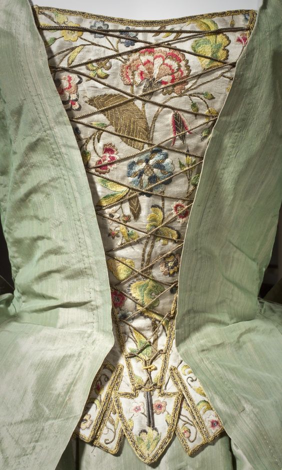 #FridayNightFrills Detail of 18th Century stomacher, pinned to close the overcoat of the gown. It is beautifully embroidered with floral designs, using coloured silk and metal thread. c.1725 via <a href="/LACMA/">LACMA</a>