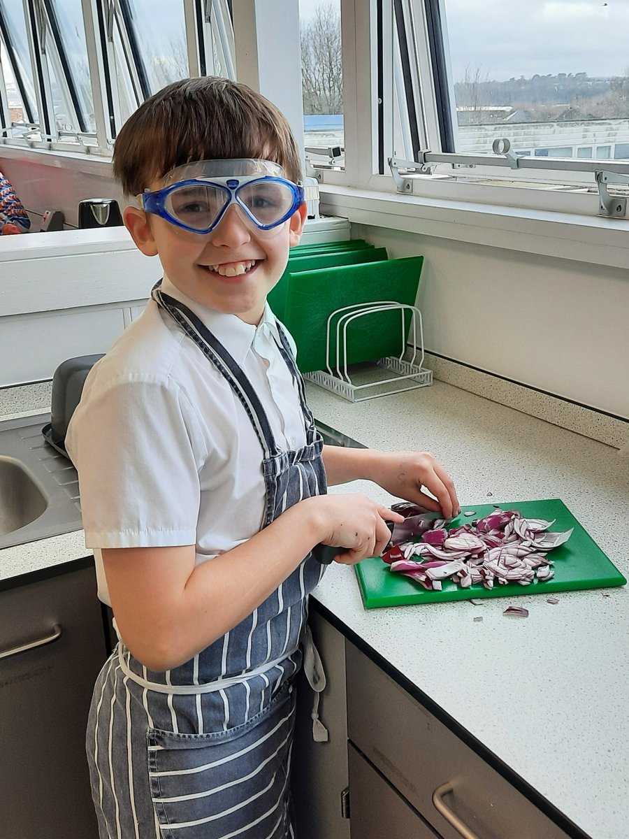 One Year 8 student has found an original way to stop himself crying while cutting onions for a bolognaise sauce in his Food Tech lesson.  Great idea Thomas!