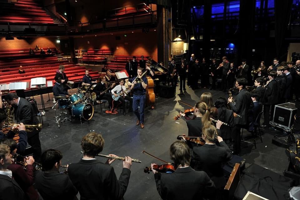 RAFMusic's tweet photo. The #RAF #Squadronaires had an amazing day at @DeanCloseSchool, Cheltenham, working with students from four local schools.
The workshops developed improvisation and big band styles, culminating in an evening concert 🎶 🎙️🎷
#RAFMusic 🎺✈️🥁
#NoOrdinaryGig #MusicalWorkshop https://t.co/O6ID1Obhwf