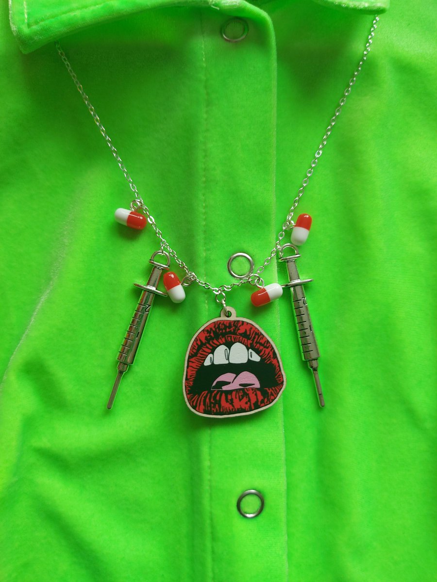 A Shot at Happiness necklaces! One with red pills left but going to be adding more to stock soon....

Love how the red pops against the green!

Link to shop below 👇