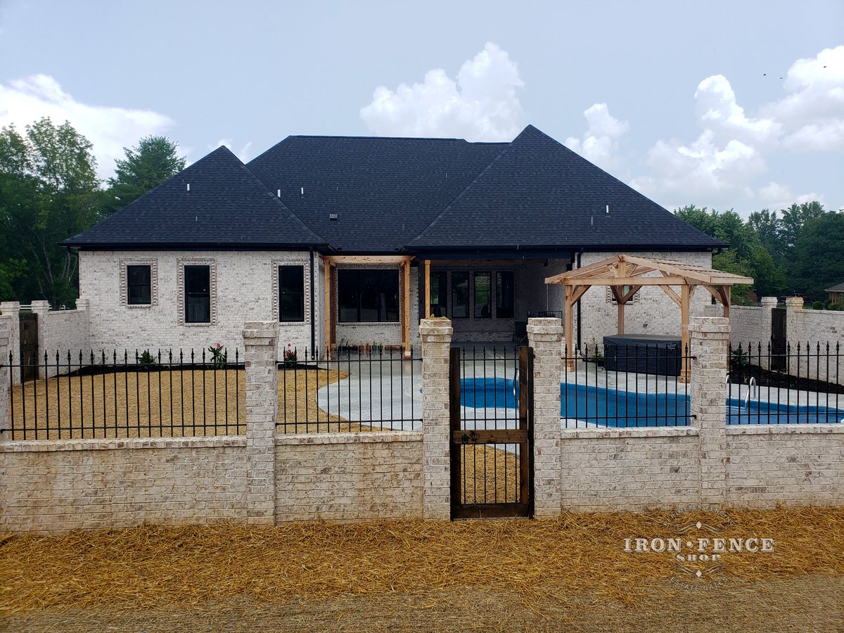 This 3 foot iron fencing on top of a lovely rockwall was the finishing touch needed for this dream home build around an in-ground pool. 

#IronFenceShop #ironfencing #pool #fencedinpool #dreamhome
