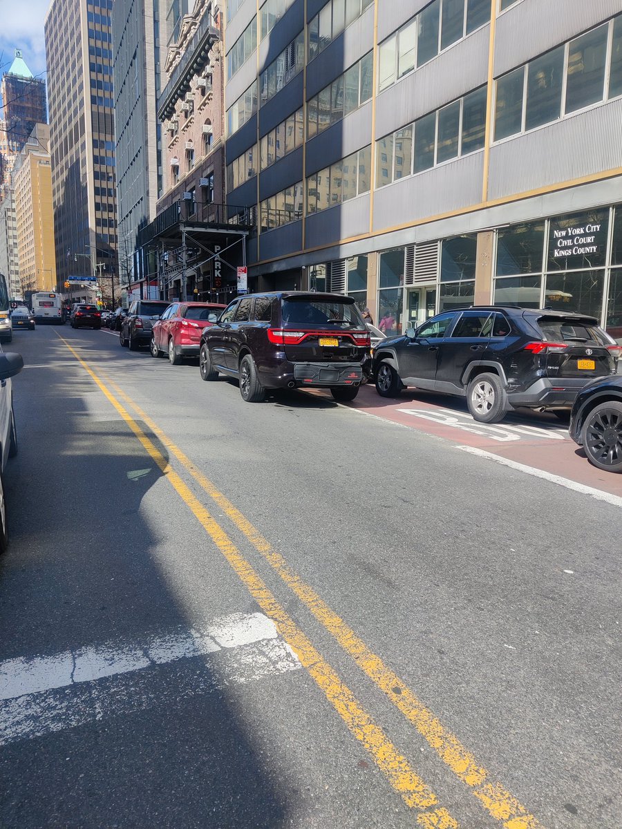 ReynosoBrooklyn's tweet photo. Bus operator has just stopped me on Livingston and Smith Street. Has said that this double parking makes it difficult and dangerous for them to move. @NYPDnews https://t.co/6dauubSCPI