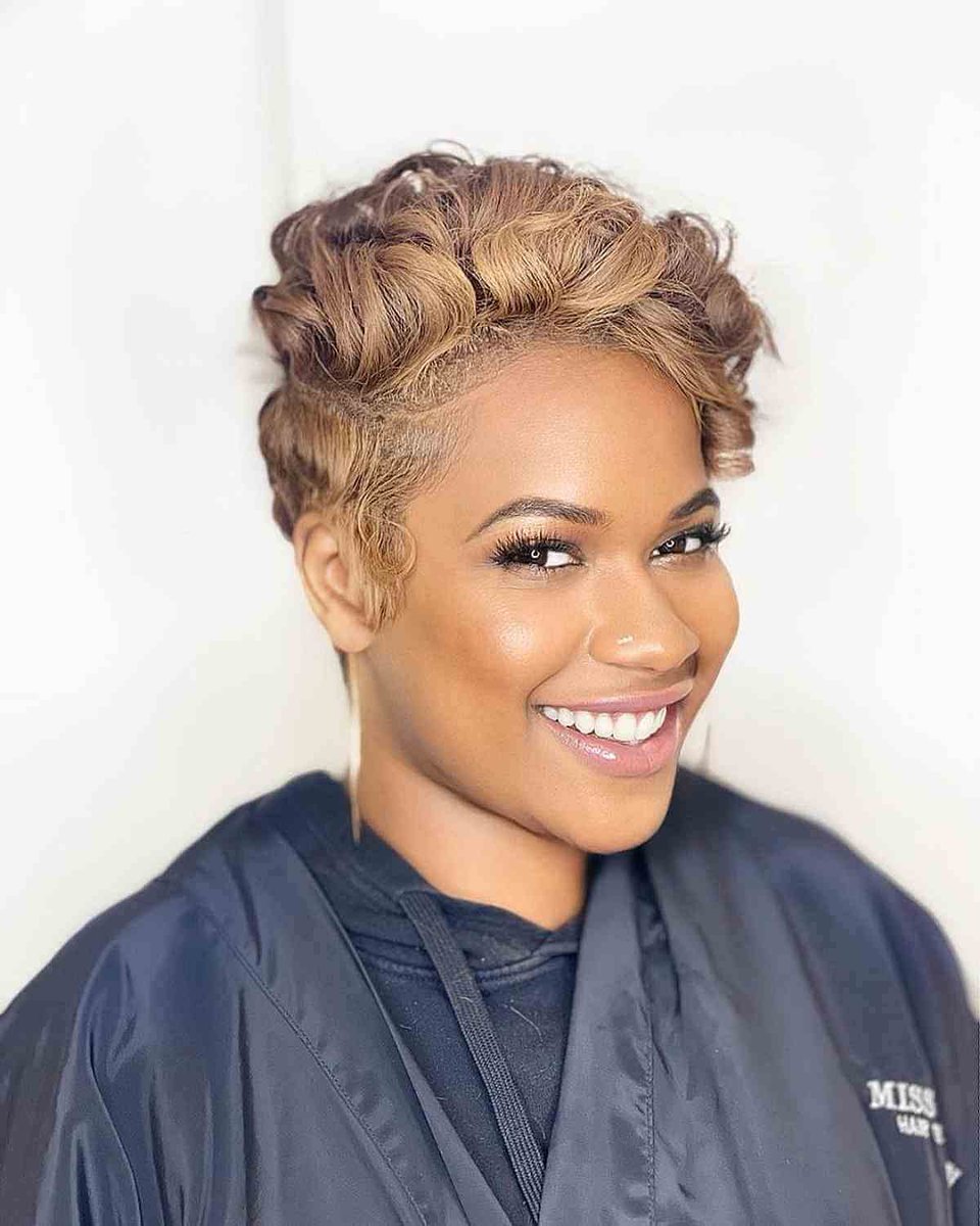 Waves and curls pixie cut- 
The waves and curls are a great way to spice up your basic pixie cut, a great way for standing out in a crowd.