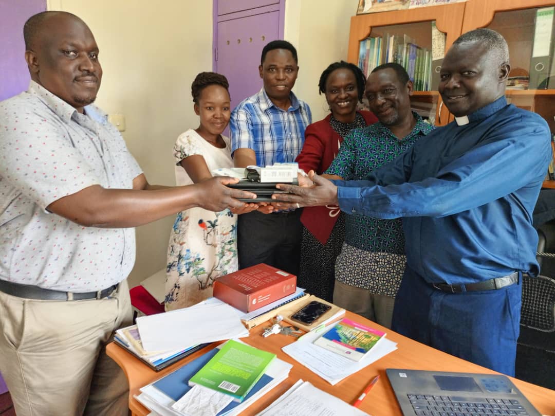 UCUSocialSciencesSch. (@ucusoc_sciences) on Twitter photo The Dean <a href="/UCUSoc_Sciences/">UCUSocialSciencesSch.</a> Rev. Can. Dr. David Andrew Omona and staff on behalf of the School, receive a donation of 3 iPads from University of Antwerp, Belgium, that were delivered by Dr. Jeremy Waiswa, HoD Research and Postgraduate Studies to aid field research at the School. The Dean <a href="/UCUSoc_Sciences/">UCUSocialSciencesSch.</a> Rev. Can. Dr. David Andrew Omona and staff on behalf of the School, receive a donation of 3 iPads from University of Antwerp, Belgium, that were delivered by Dr. Jeremy Waiswa, HoD Research and Postgraduate Studies to aid field research at the School.