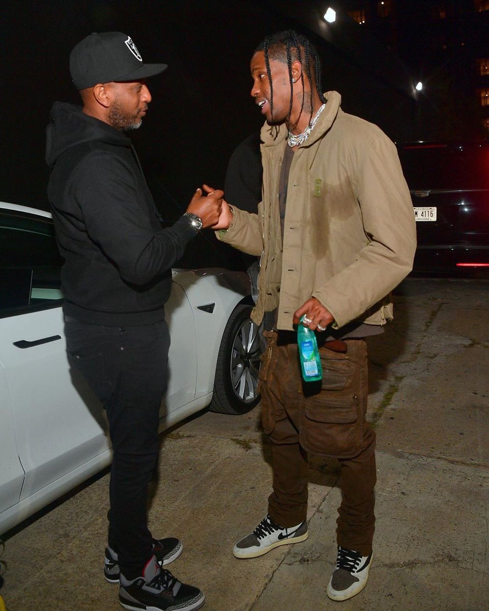 travis scott wearing travis scott jordan 1