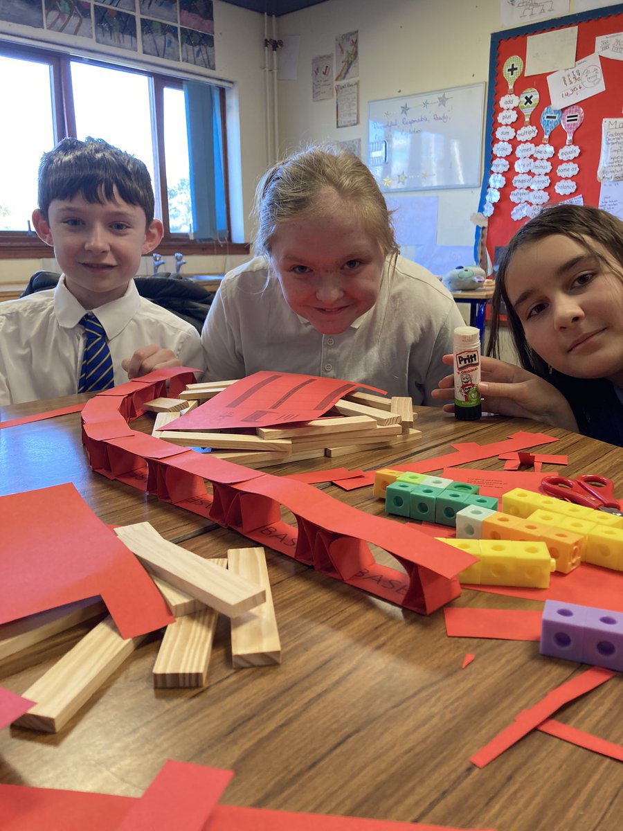 MrsPatonVPS's tweet photo. We were constructing buildings today. We used paper to create triangular structures which developed into the Tay bridge! I could hold 3 iPads and two hard copy books!!! Not bad for paper!!!! #vpsstem https://t.co/5IcPf3tbZM