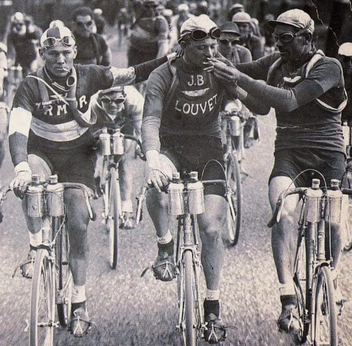 Tour de France competitors smoking cigarettes mid-race, 1927