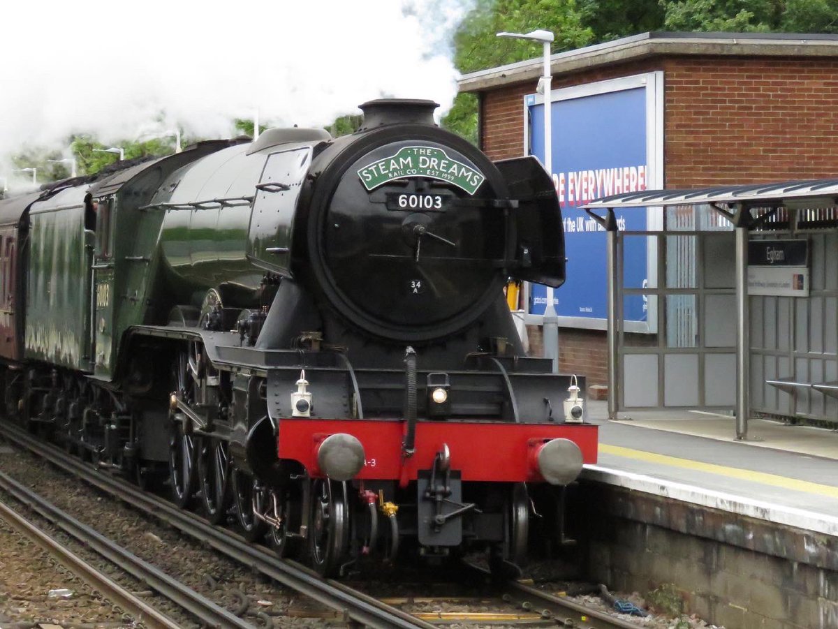 brownandrew15's tweet photo. 100 years of Flying Scotsman and still going… seen here on it’s visit to the @Watercress_Line in February 2020, and passing #Egham and #Winchester in May and June 2021 on rail tours. #LNERA3 #GresleyA3Pacific #FlyingScotsman #FlyingScotsman100 @RailwayMuseum https://t.co/tONh2xwPkW