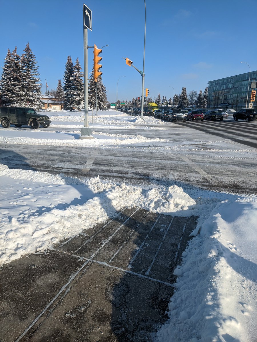davidbarrettyyc's tweet image. Forgot my mountaineering equipment this morning. Guess it means I can't cross anywhere at Crowchild and 24th ave NW today.