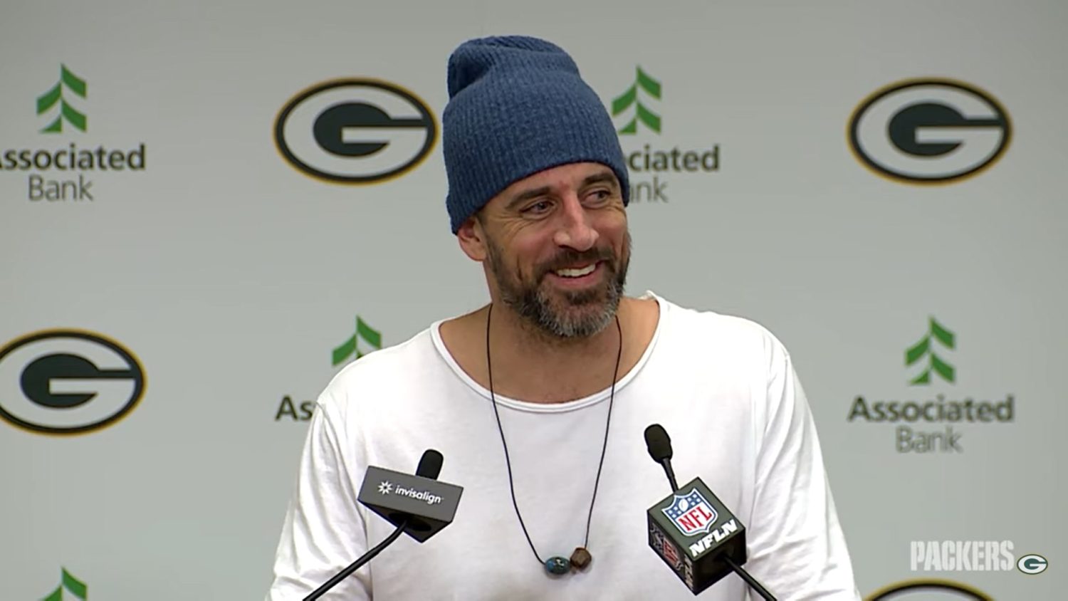 Aaron Rodgers checks out crystals as he waits for Jets trade