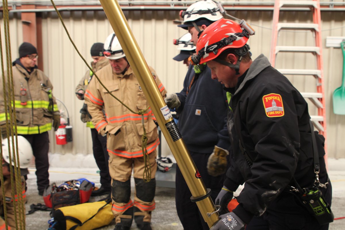 Topekafire's tweet photo. This chilly weather didn’t stop TFD Stations 9, 10, and 11 from participating in their annual technical rescue training at @Fritolay. TFD is always training to strengthen skills to better serve the community. https://t.co/DMWOAJEbCd