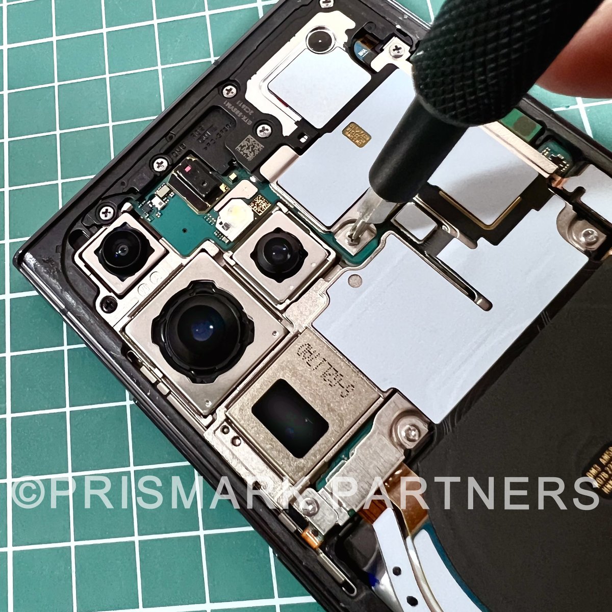 PrismarkLLC's tweet photo. Prismark’s latest teardown the Samsung Galaxy S23 Ultra Highlights include: 
Chipset: Qualcomm SM8550-AC Snapdragon 8 Gen 2 
Quad Cameras: 200MP 24mm wide | 10MP 230mm periscope telephoto | 10MP 70mm telephoto |12MP ultrawide #qualcomm #snapdragon #chipset #pcb  #semi #teardown https://t.co/1qyFh3zqVD