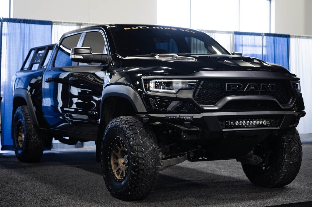 Addoffroad's tweet photo. Huge shoutout to @bullhide4x4 for building this sweet RAM TRX for us a few weeks back for the @keystoneautomotiveoperations Big Show!

This TRX features our brand new Phantom Front &amp; Rear Bumpers along with our Universal Bed Rack.

#addictivedesertdesigns #addoffroad #dodger… https://t.co/buvEeecMAm