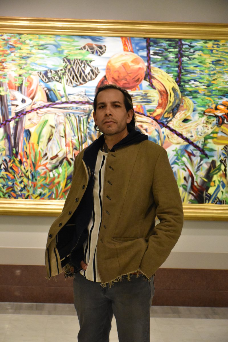 OKArtsCouncil's tweet image. Thrilled to have artist @Yatikafields with us today as we installed his new mural near the visitor entrance at the Oklahoma State Capitol. It's entitled: "Spiro: Serpent River, Shelled Stories, Sun-Touched Engravings."