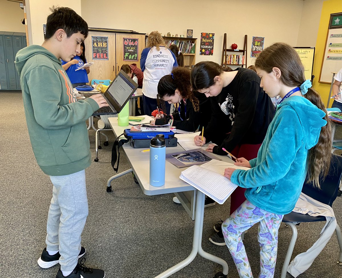 ELA students participated in a figurative language carousel. Students rotated from picture to picture as they crafted sentences using a variety of figurative language.