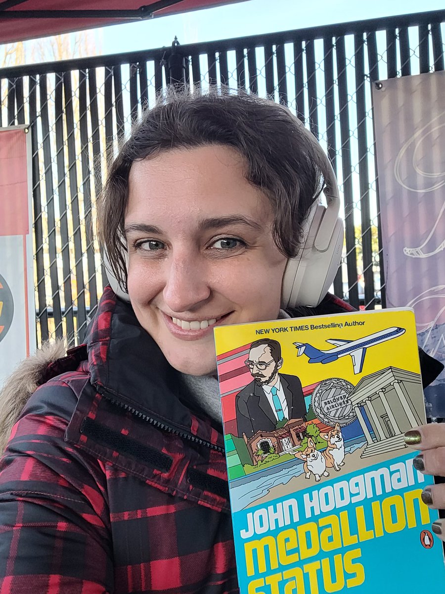 Macheefla's tweet photo. Listening to this week's @doughboyspod while reading the @hodgman book (now available in paperback) Medallion Status. What a Friday treat. https://t.co/AVxNvcLahy