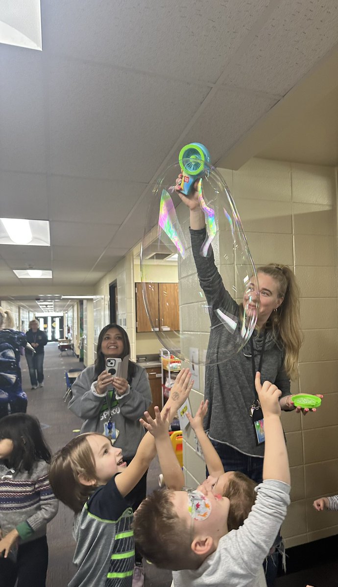 ELC_SuperSpeech's tweet photo. Those faces say it all! Our PBIS all-school bubble party was a HUGE success! Way to be safe &amp; kind, Super Sprouts! 🫧 🎉 #PBIS #weareELC #safe  #kind #bubbleparty #Seeds #SproutingSuccess #bucketfull https://t.co/o92yICV3df