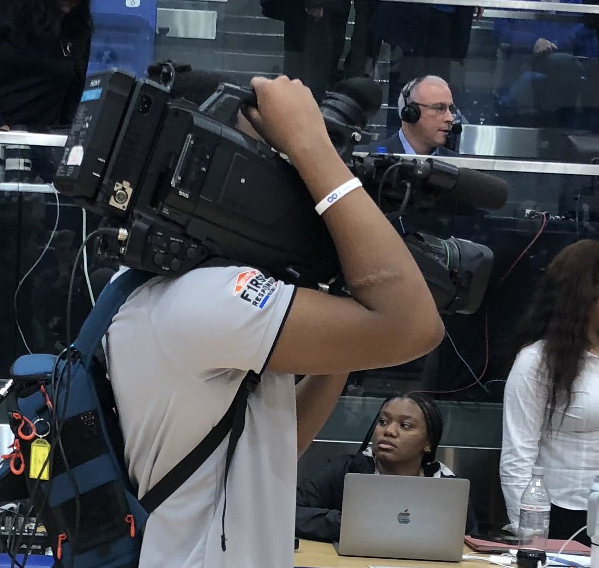 I only have about 40 years experience shooting video, but I’m pretty sure he’s doing it wrong