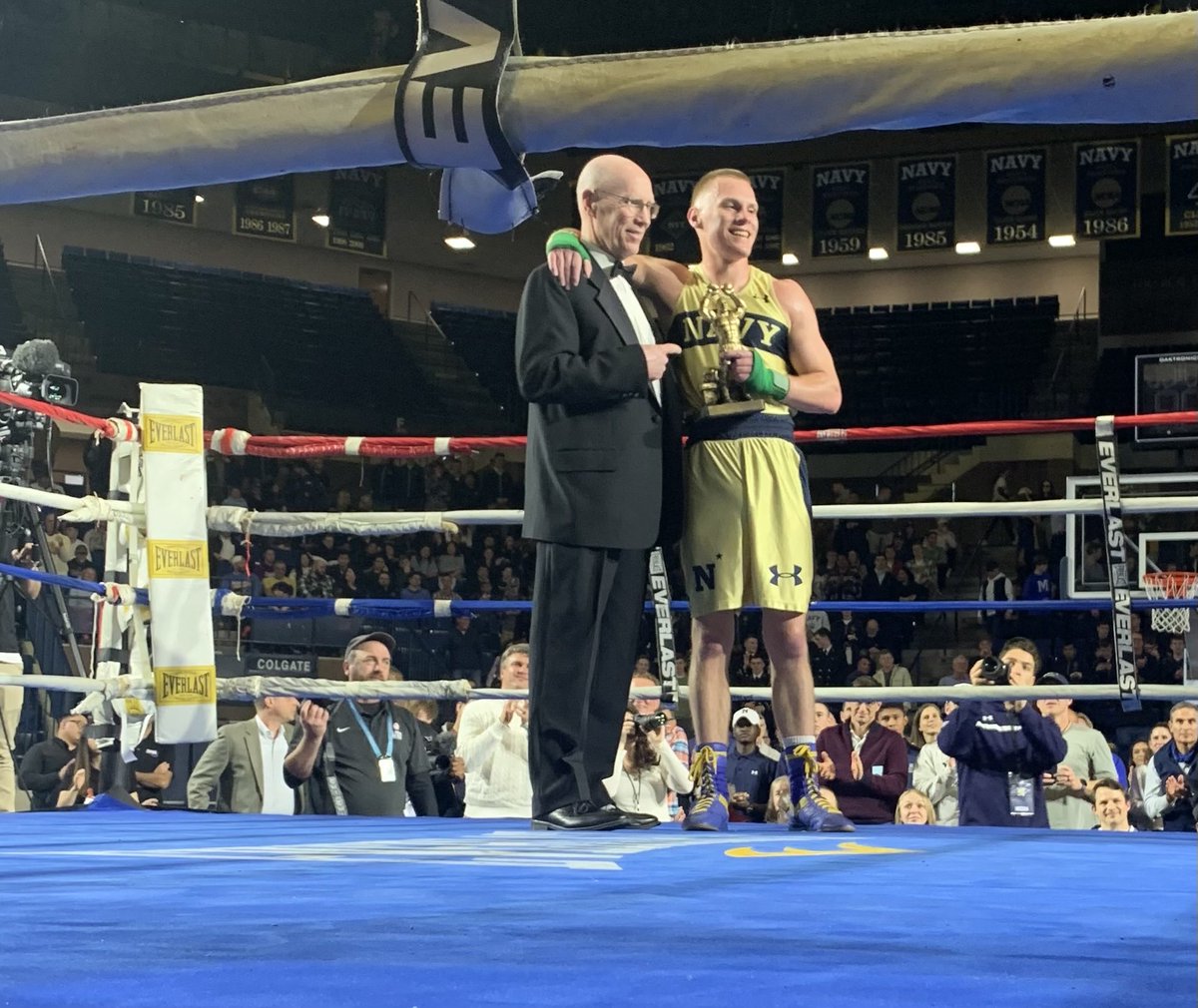 RobbDunn's tweet photo. In a bout that lived up to the hype, Aidan McNally became the 24th Tony Rubino Award (4-time #BrigadeBoxing Champion) by defeating his roommate - & 3-time Champion - Adrian Johnson. Fitting moment for his dad, Jim, coaching his 37th - & final - Brigades! #GoNavy https://t.co/EcdfFJ8uK1