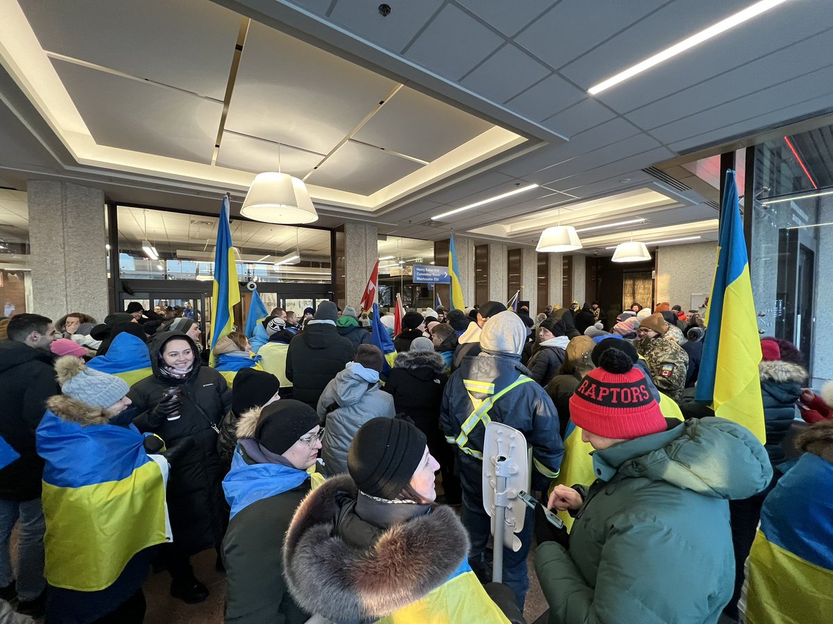 seanmceachern's tweet photo. It was a cold night for the Stand with Ukraine vigil in Regina. Thankfully, all the supporters who attended were invited inside City Hall. СЛАВА УКРАЇНІ https://t.co/BiNRVrjFEw