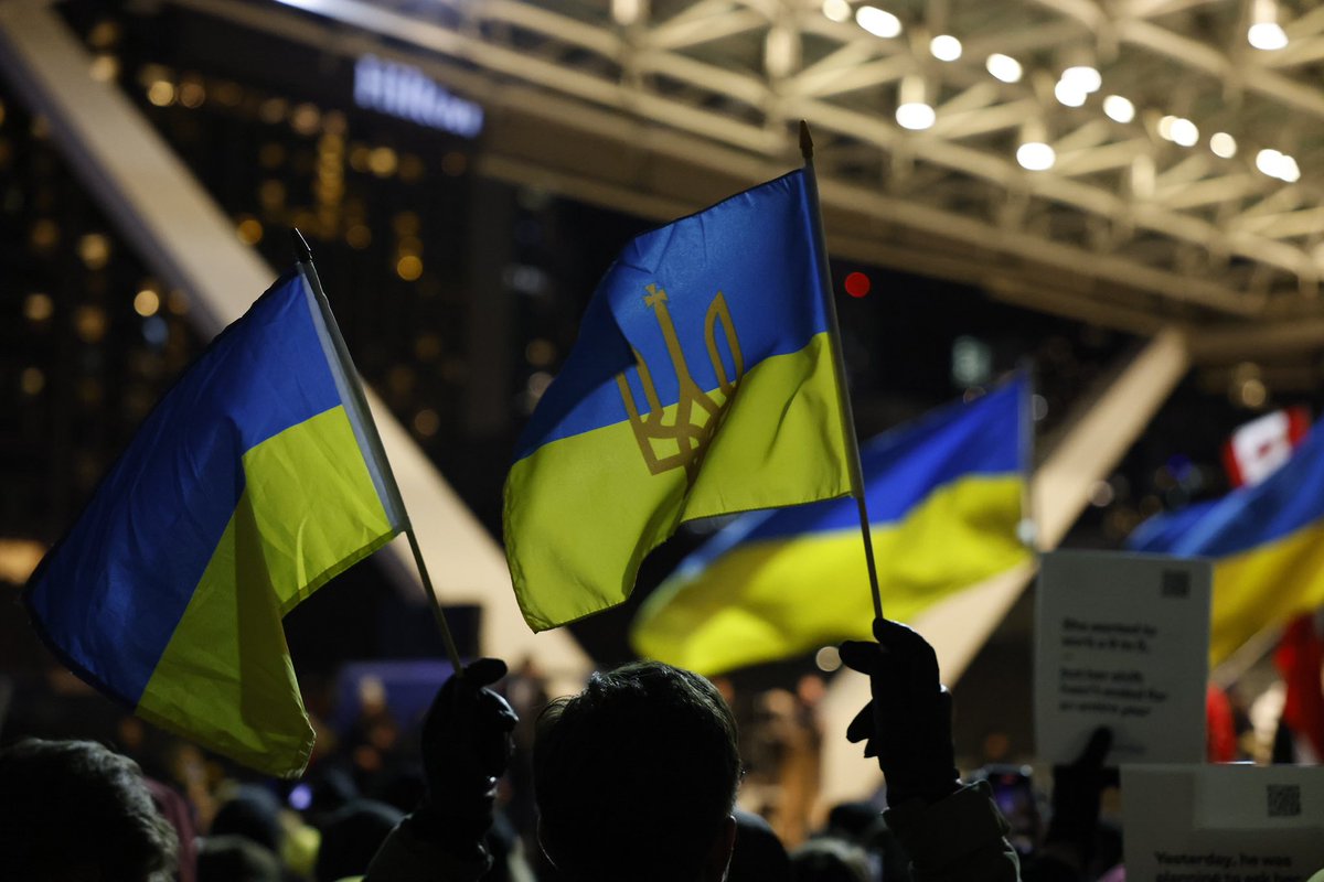 lancemcmillan's tweet photo. Solidarity march in Toronto, marking one year since Russia’s invasion of Ukraine. https://t.co/wKW6EQSfey