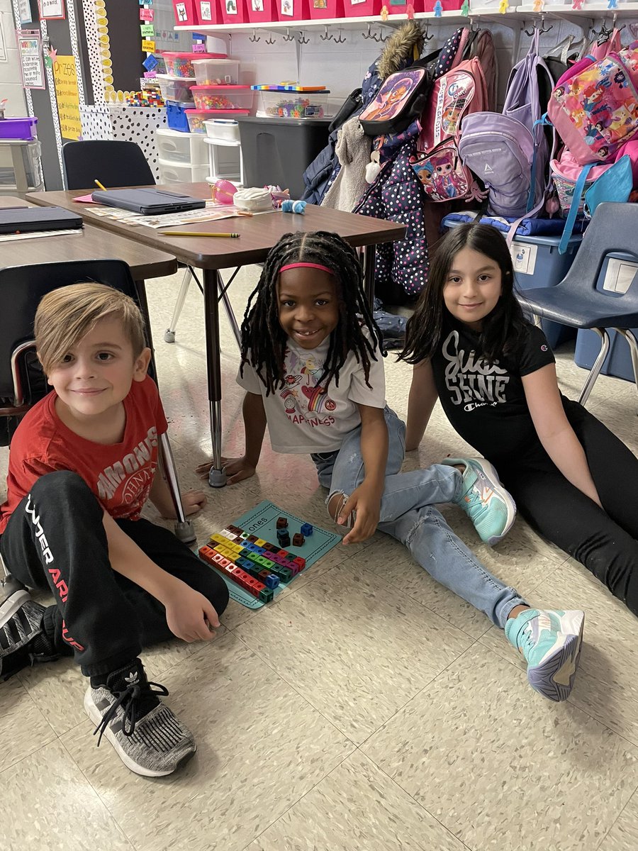 Our first grade mathematicians have been using manipulatives to better understand place value. They love working collaboratively to strengthen their conceptual understanding of math! #KirbyONE40 #McAuliffeProud