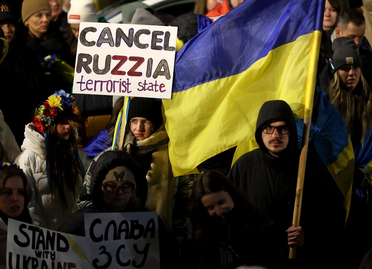 To mark the one year anniversary of the war in Ukraine, people honor the victims and protest against the war outside of Saints Volodymyr and Olha Ukrainian Catholic Church in Chicago’s Ukrainian Village neighborhood on Friday.