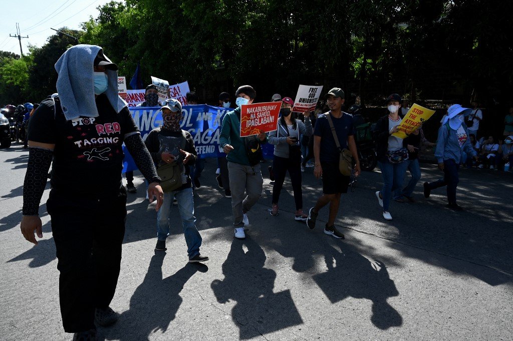 Protesters gather during a rally marking the 37th anniversary of the ...