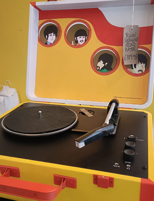 putneyexchange's tweet photo. How cool is this record player! No, this is not a toy. Perfect for playing your favourite vinyl's and grooving away, this Beatles themed is, along with love, all you need… 'We all live in a yellow submarine' as the iconic song goes!

#huttons #putney https://t.co/ic66iQznQF