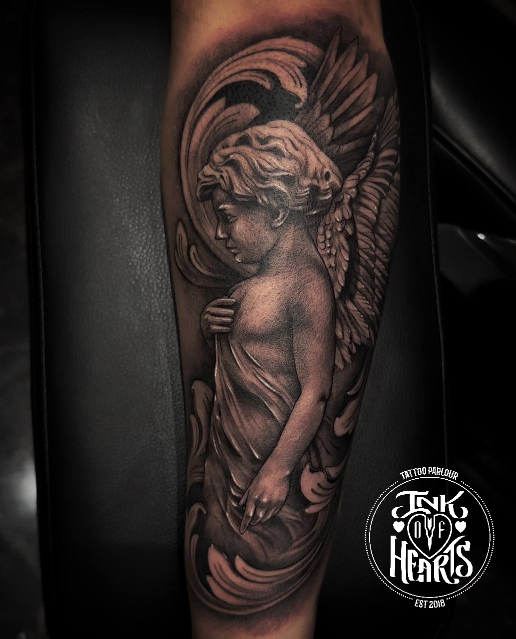 baby angel tattoo sleeve