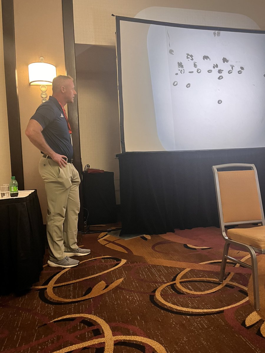 NDcharger_fball's tweet photo. @CoachStirn going against Castle’s head coach in yesterday’s chalk wars at the @INFBCoaches state clinic. https://t.co/cG9ZyXEd16